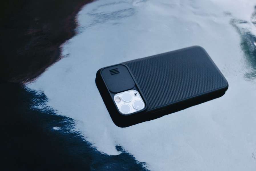 iphone with a case on the ground